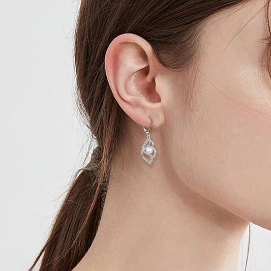 Boucles d'oreilles torsadées en perles d'eau douce véritables et diamants