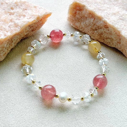 Pulsera de equilibrio de cuarzo rutilado y cristal de fresa roja