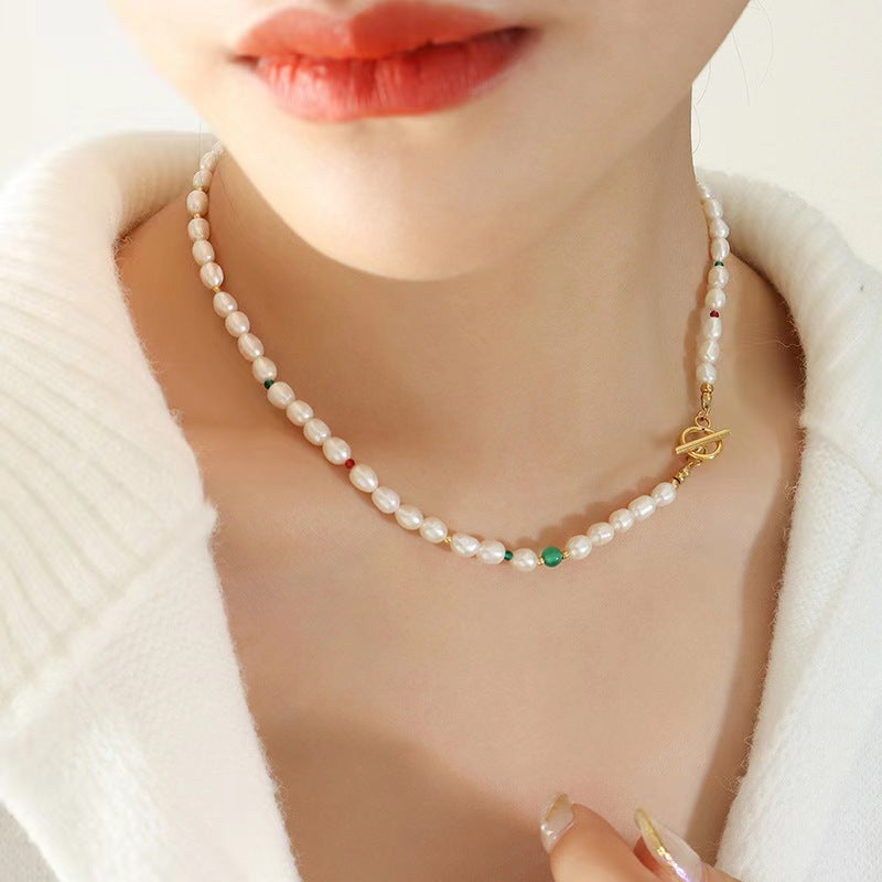 Collar de ojo verde de acero y titanio con perla de agua dulce genuina