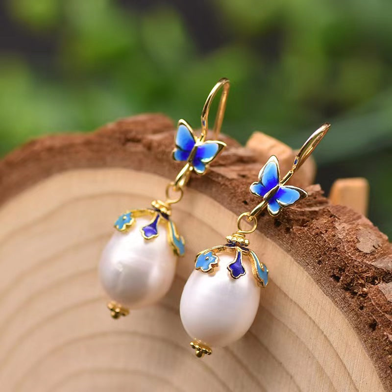 Pendientes de mariposa azul con auténtica perla barroca de agua dulce (edición limitada)