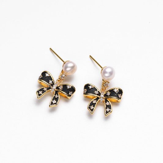 Boucles d'oreilles nœud papillon en perles d'eau douce véritables