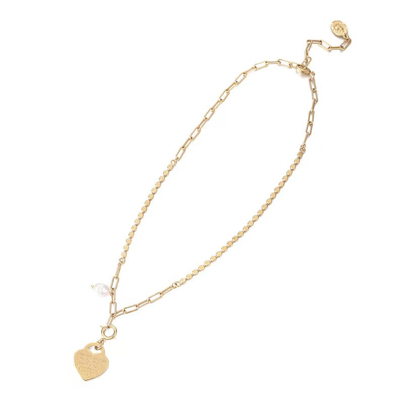 Collar con placa de corazón de perla de agua dulce genuina
