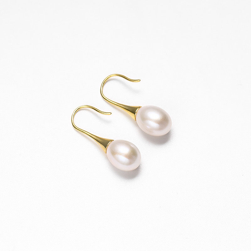 Boucles d'oreilles bougies dorées en perles d'eau douce véritables