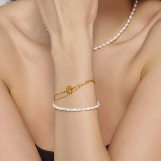 Pulsera Lucky Dew de acero y titanio con perla de agua dulce genuina