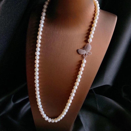 Collar de mariposa con perlas de agua dulce genuinas