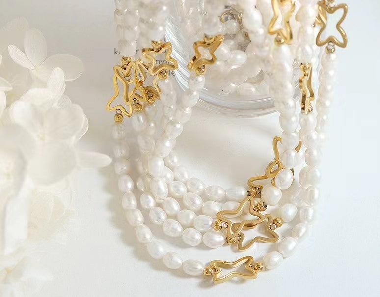 Collar de estrella fugaz de titanio con perla de agua dulce genuina