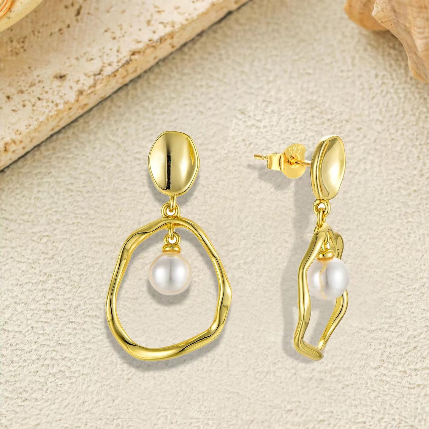 Boucles d'oreilles en or avec perles d'eau douce véritables