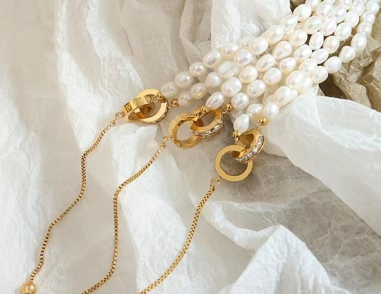 Collar de acero y titanio con forma de círculo de la esperanza y perla de agua dulce auténtica