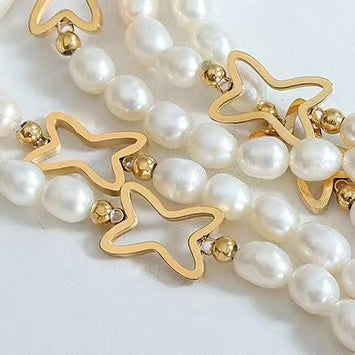 Collar de estrella fugaz de titanio con perla de agua dulce genuina
