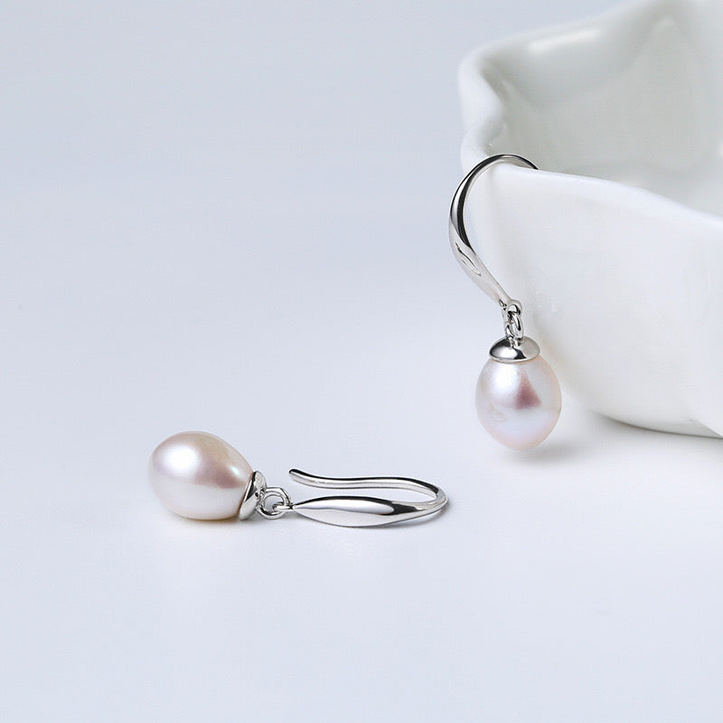 Boucles d'oreilles Vénus en véritables perles d'eau douce
