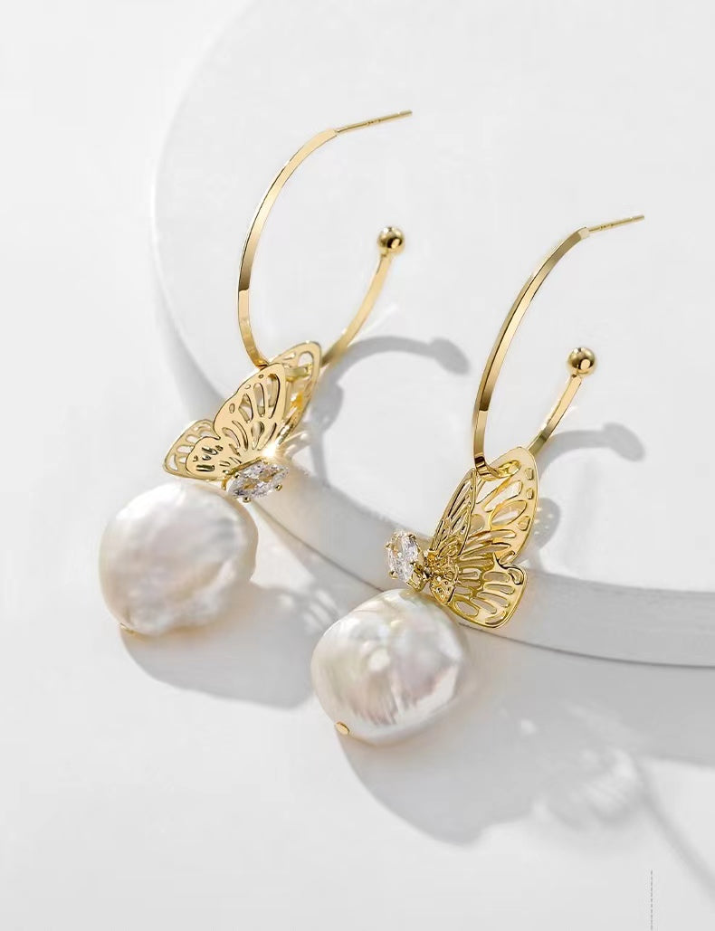 Boucles d'oreilles papillon en perles baroques véritables