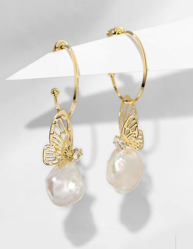 Boucles d'oreilles papillon en perles baroques véritables