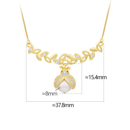 Collar de escarabajo con diamantes y perlas barrocas auténticas de plata maciza S925