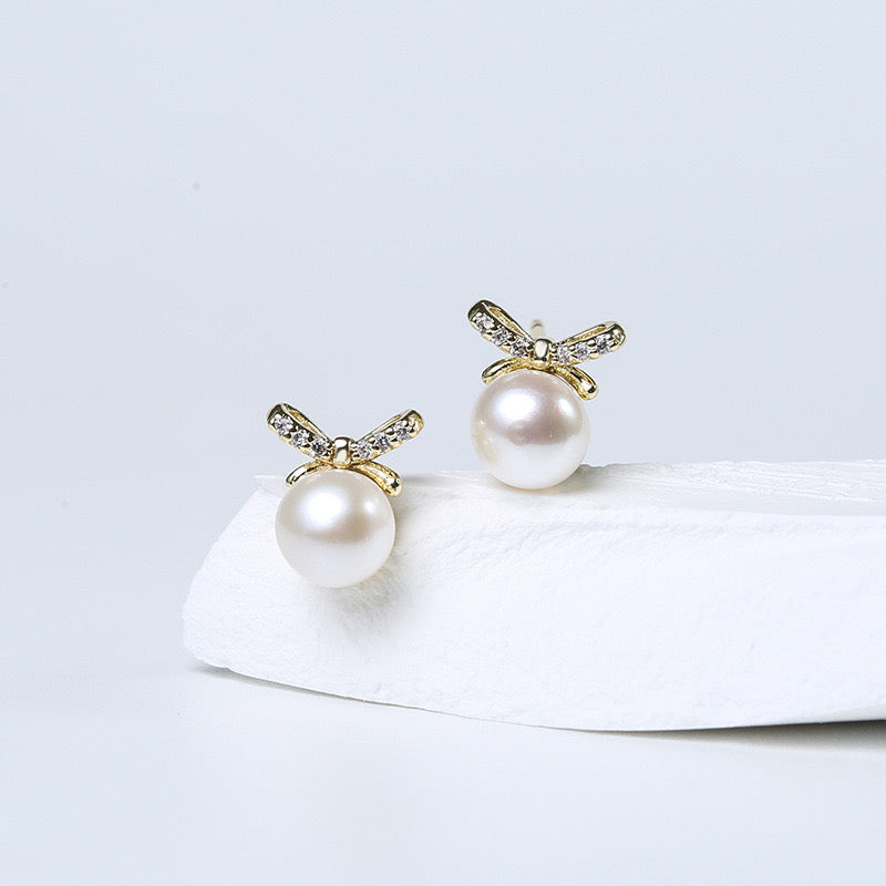 Boucles d'oreilles nœud papillon en perles d'eau douce véritables