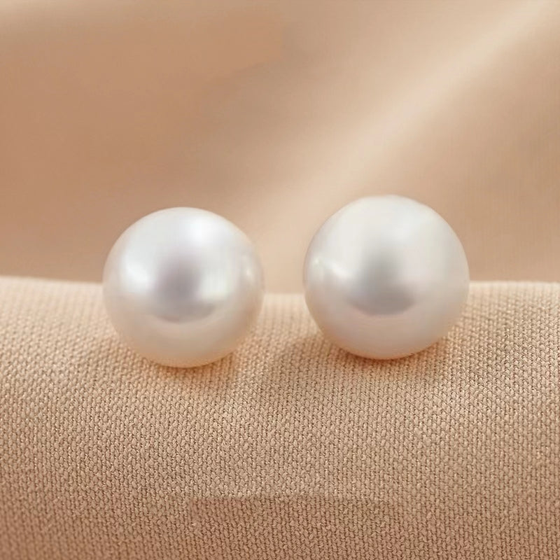 Boucles d'oreilles Corlene en véritable perle d'eau de mer