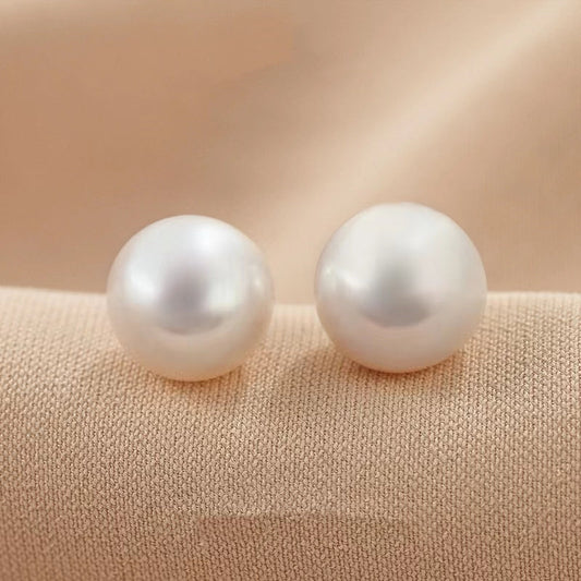 Boucles d'oreilles Corlene en véritable perle d'eau de mer