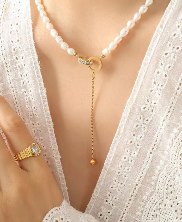 Collar de acero y titanio con forma de círculo de la esperanza y perla de agua dulce auténtica