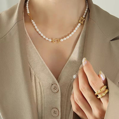Collar de estrella fugaz de titanio con perla de agua dulce genuina