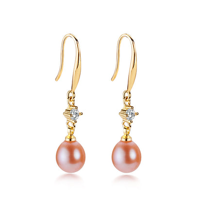 Boucles d'oreilles Céleste en laiton plaqué or 18 carats et véritable perle d'eau douce
