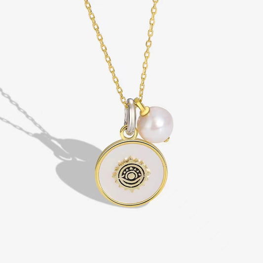 Collier en argent massif S925 avec véritable perle d'eau douce et œil de chance