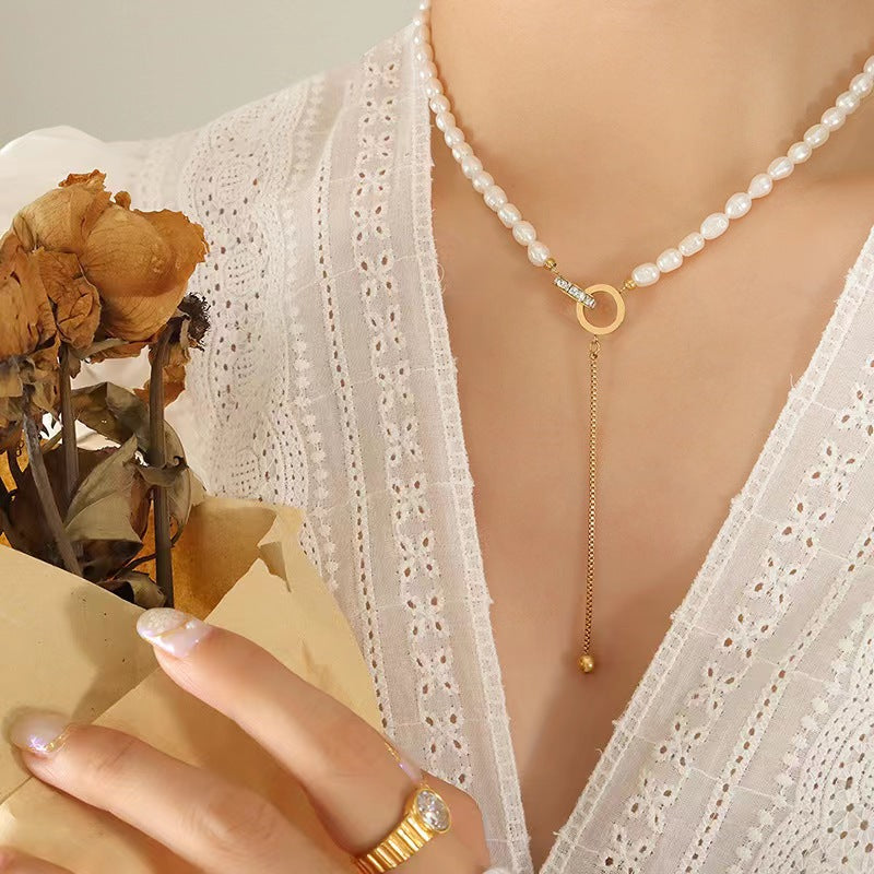 Collar de acero y titanio con forma de círculo de la esperanza y perla de agua dulce auténtica