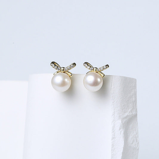 Boucles d'oreilles nœud papillon en perles d'eau douce véritables