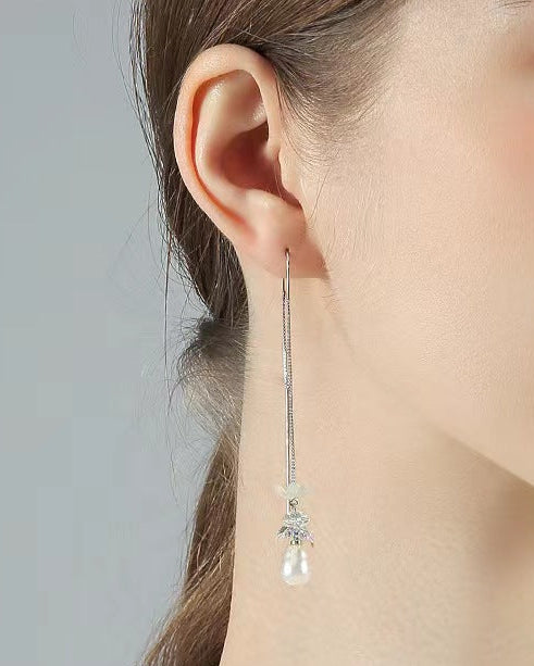 Boucles d'oreilles en perles d'eau douce véritables et fleurs bleues