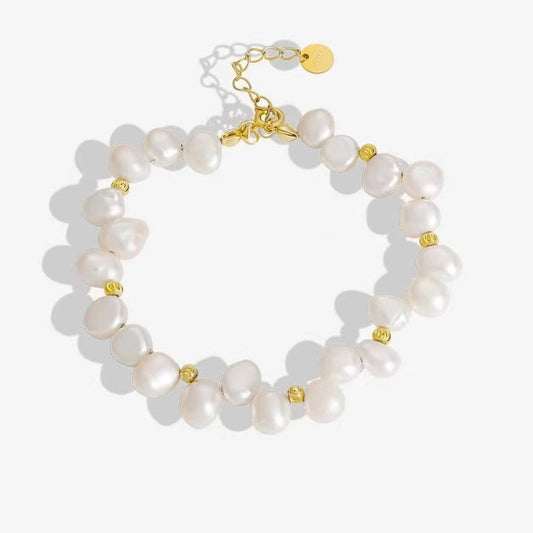 Pulsera de plata maciza S925 con auténtica perla barroca.