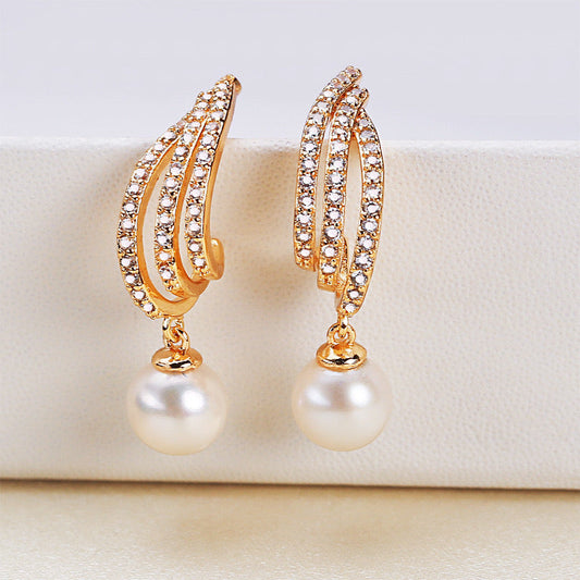 Boucles d'oreilles Maxine en laiton plaqué or 18 carats et véritables perles d'eau douce