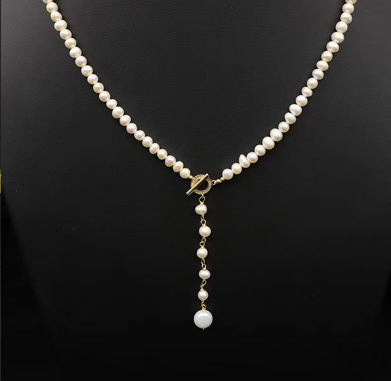 Collar Éblouissant de cola de elfo con perlas de agua dulce genuinas