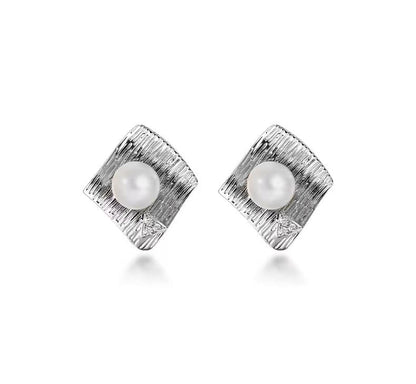 Pendientes de perlas de agua dulce genuinas con ondas de agua
