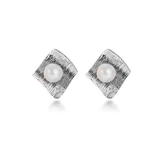Pendientes de perlas de agua dulce genuinas con ondas de agua