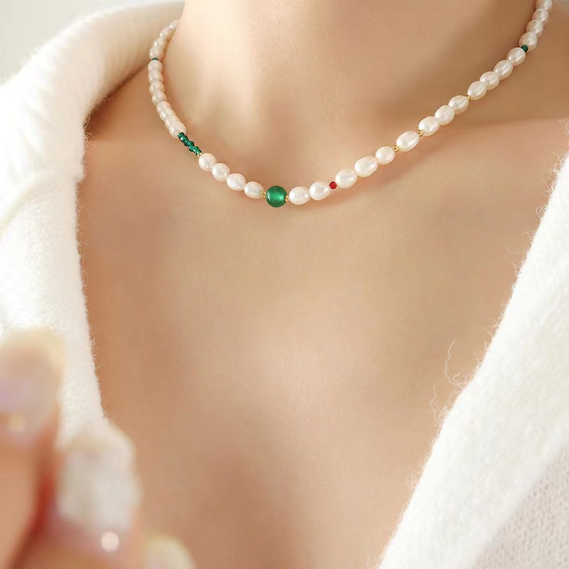 Collar de ojo verde de acero y titanio con perla de agua dulce genuina