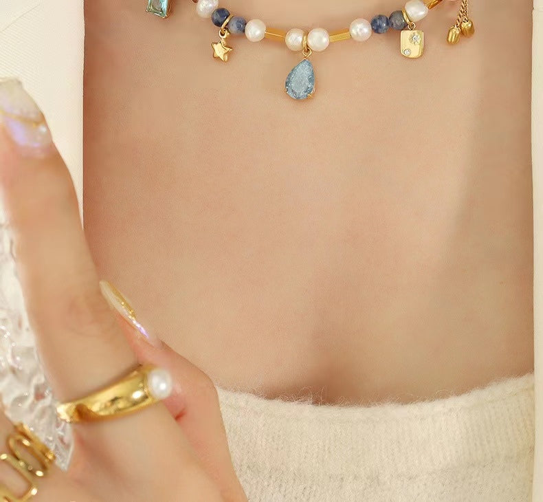 Collar de acero de titanio con perlas de agua dulce auténticas y sueño azul
