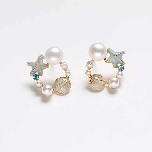 Boucles d'oreilles Ocean Zing en argent massif S925 et véritables perles d'eau douce