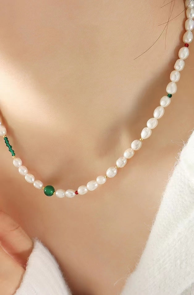 Collar de ojo verde de acero y titanio con perla de agua dulce genuina
