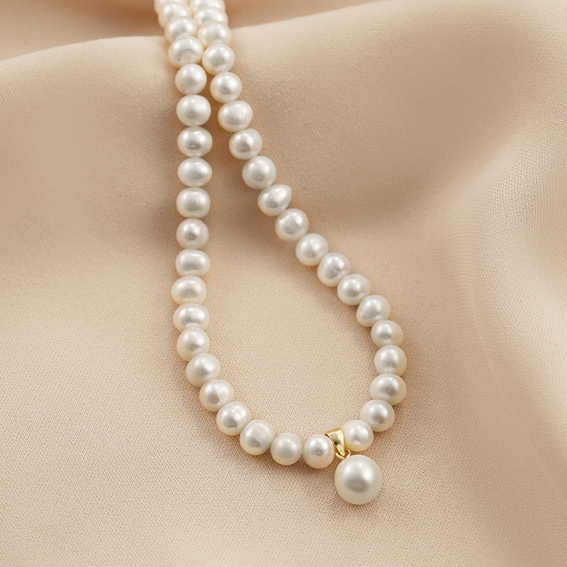 Genuine Freshwater Pearl S925 Silver Sawa Necklace - Lifestyle/Scale View - Elegant Pearl Jewelry by Kikyo Pearl London