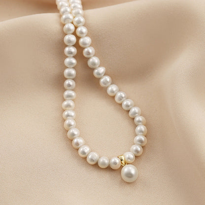 Genuine Freshwater Pearl S925 Silver Sawa Necklace - Lifestyle/Scale View - Elegant Pearl Jewelry by Kikyo Pearl London