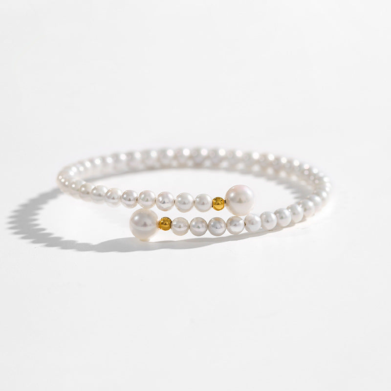Pulsera de la paz con perla genuina de agua dulce AAAA en oro macizo de 18 quilates
