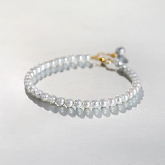 Bracelet en or massif 18 carats et véritable perle d'eau douce au mercure