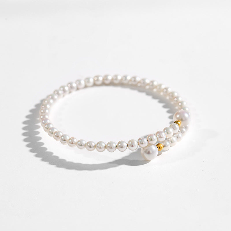 Pulsera de la paz con perla genuina de agua dulce AAAA en oro macizo de 18 quilates