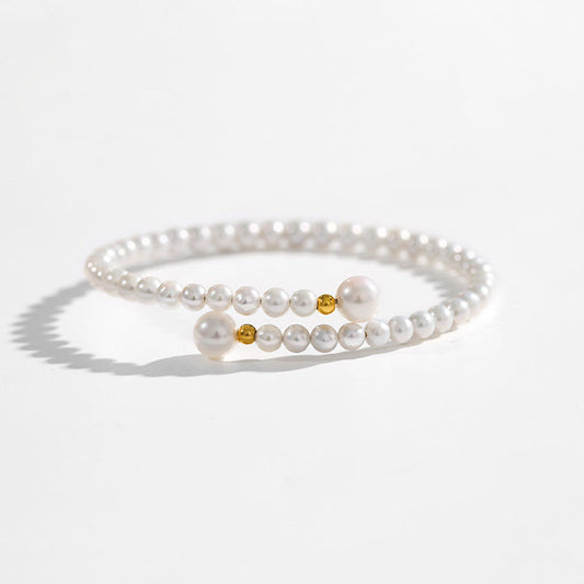 Pulsera de la paz con perla genuina de agua dulce AAAA en oro macizo de 18 quilates
