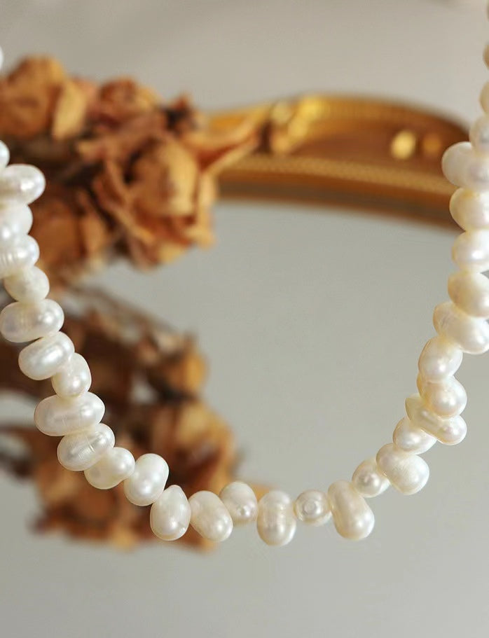 Collar de arroz de acero y titanio con perla de agua dulce genuina