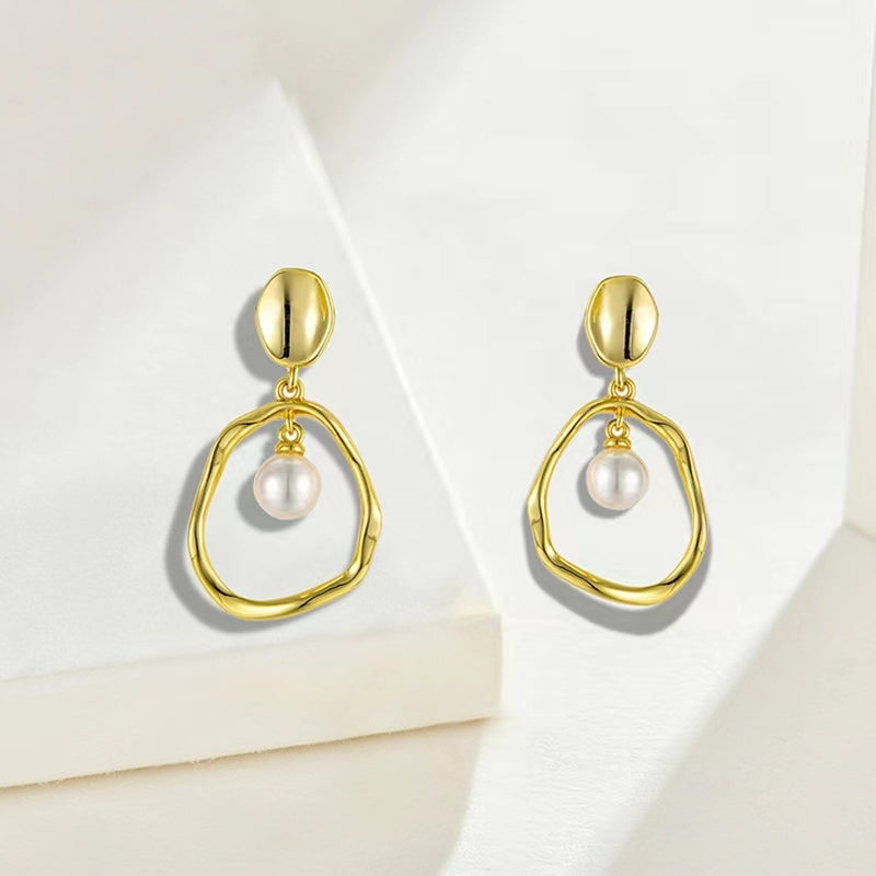 Boucles d'oreilles en or avec perles d'eau douce véritables