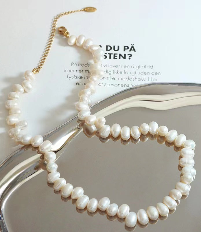 Collar de arroz de acero y titanio con perla de agua dulce genuina