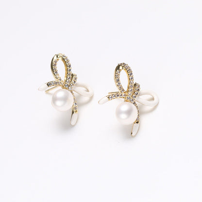Boucles d'oreilles en argent massif S925 avec perles d'eau douce véritables et nœud porte-bonheur