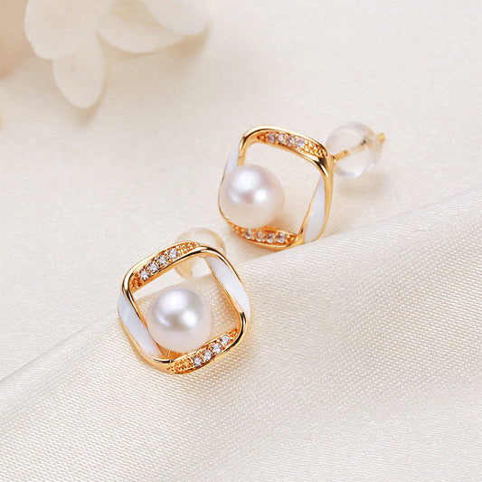 Boucles d'oreilles Martina en laiton plaqué or 18 carats et véritables perles d'eau douce