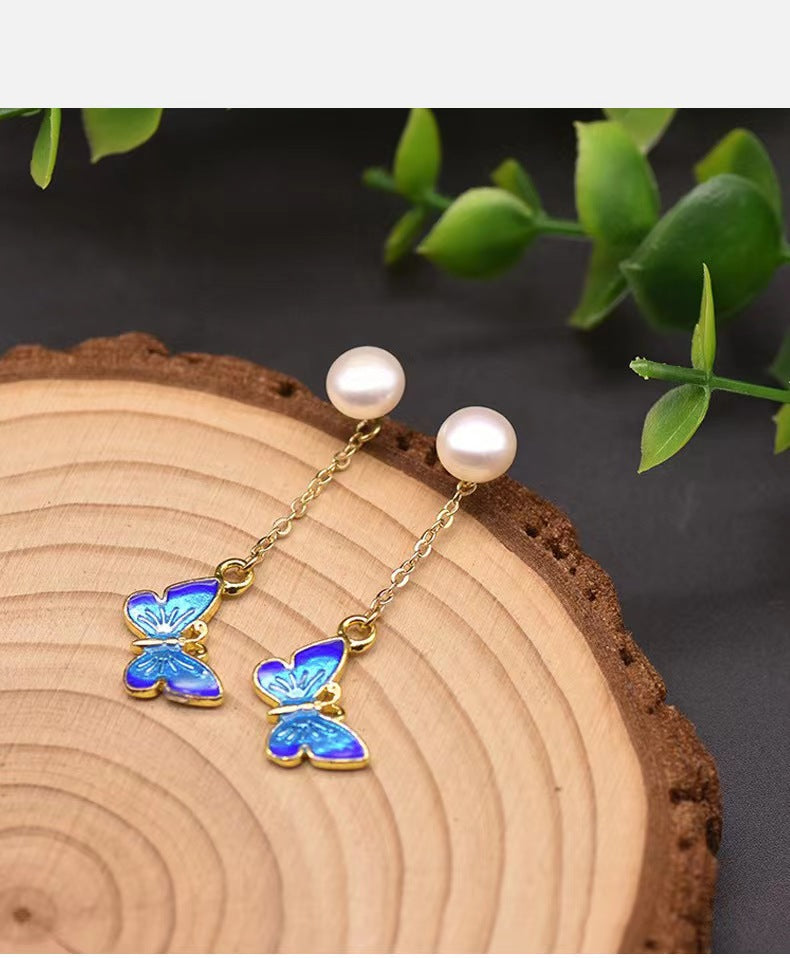 Boucles d'oreilles papillon bleues en perles baroques d'eau douce véritables (édition limitée)
