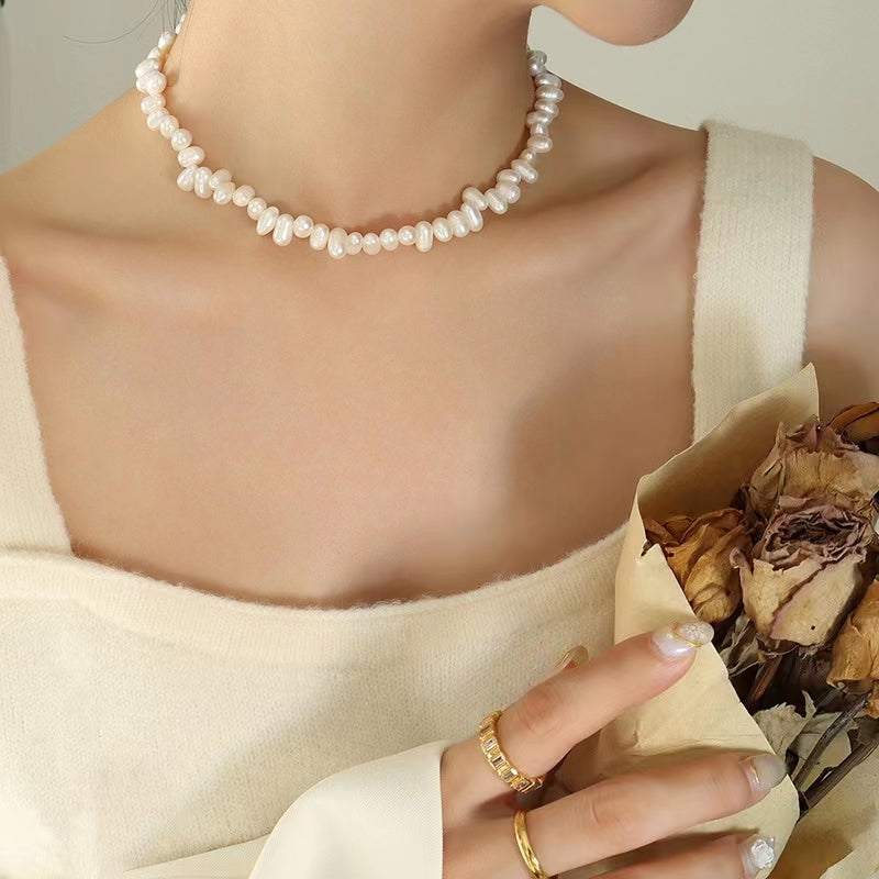 Collar de arroz de acero y titanio con perla de agua dulce genuina