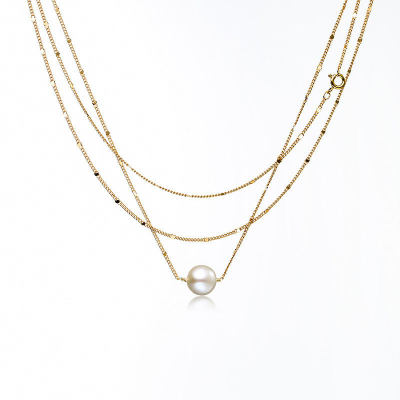 Collar de capas doradas con perlas de agua dulce genuinas